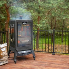 Vertical Smoker Black Label Series from Louisiana Grills on a Patio – We Love Fire