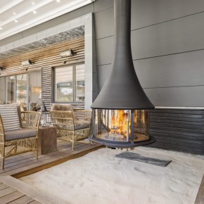 Wood Fireplace JC Bordelet Zelia by Ambiance® in an outdoor living room - We Love Fire®