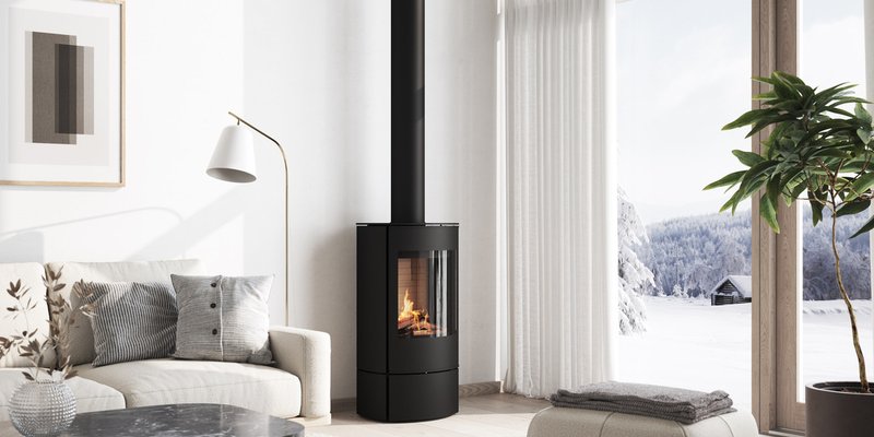RAIS® Caro freestanding gas stove in a bright living room
