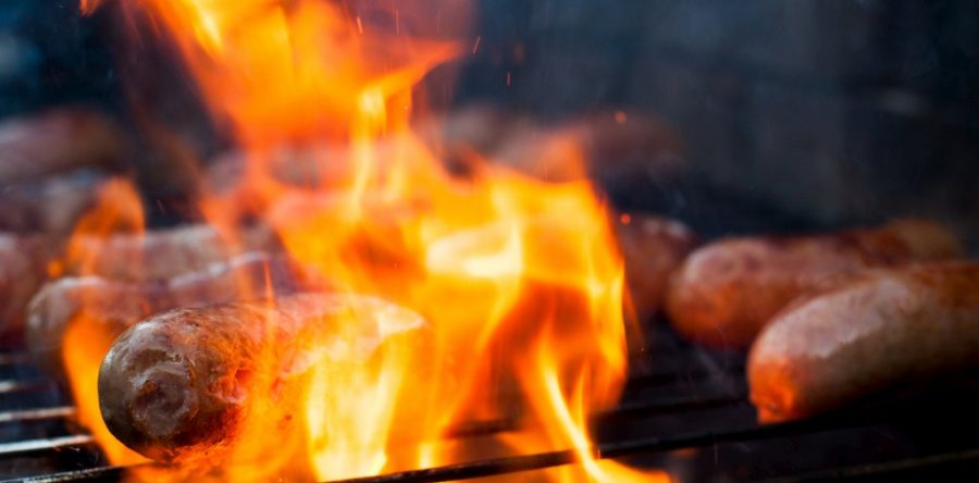 What should you do if you have a fire outbreak on your barbecue?