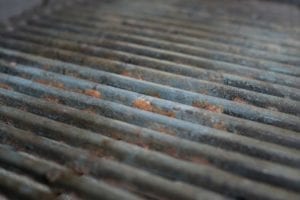 A rusty grate is one of the signs that it may be time to buy a new grill.