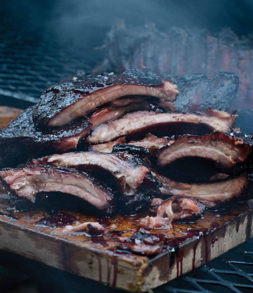 Smoked cherry-glazed ribs, Excerpted from Project Smoke by Steven Raichlen (Workman Publishing). Copyright © 2016. Photographs by Matthew Benson.