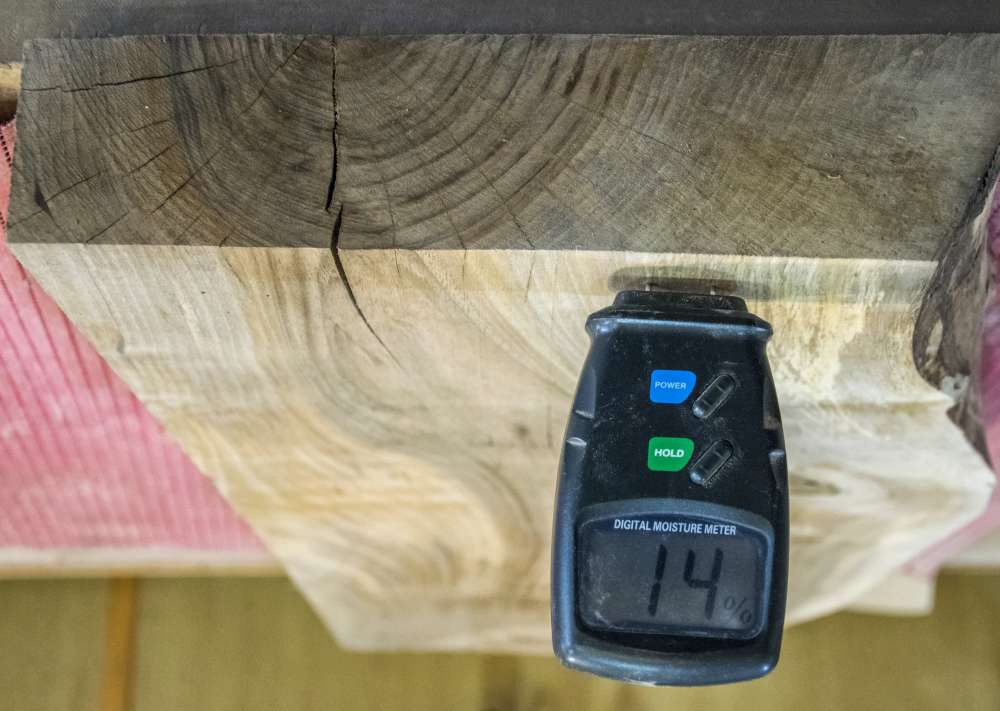 You can measure wood humidity with a moisture meter