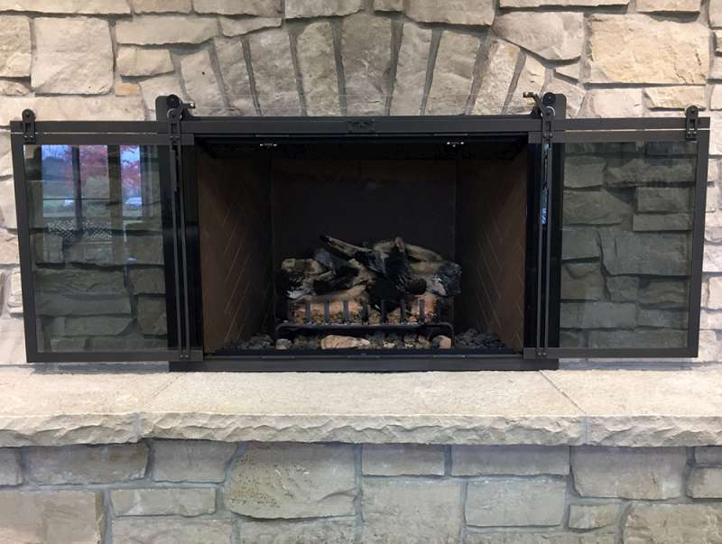 when to close glass doors on fireplace