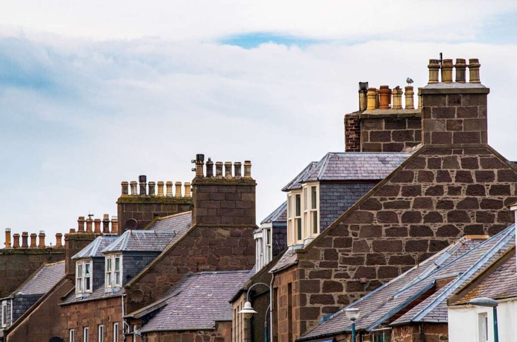 Image from Pixabay-pexel -- Row houses with chimneys, who cleans chimneys?