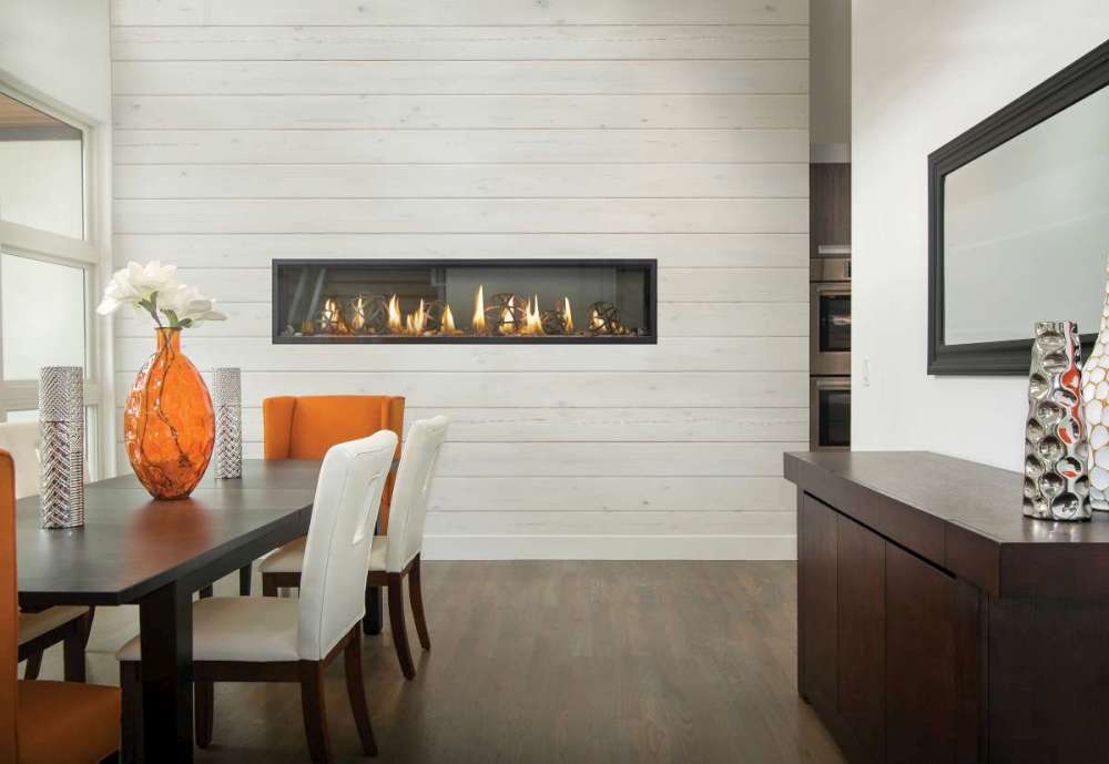 Napoleon Luxuria Gas fireplace in dining room.  How gas fireplaces work?