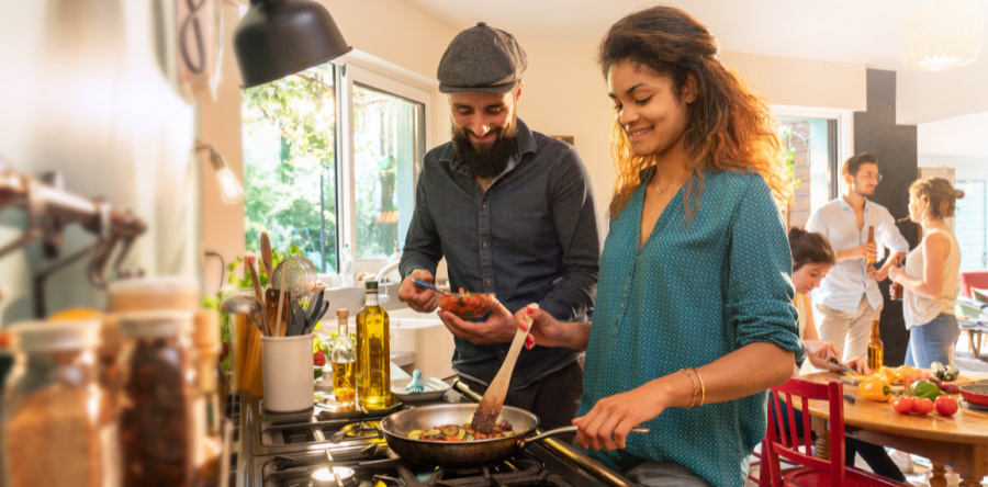 How develop the Hygge attitude 5 steps friend gathered together to cook a simple meal
