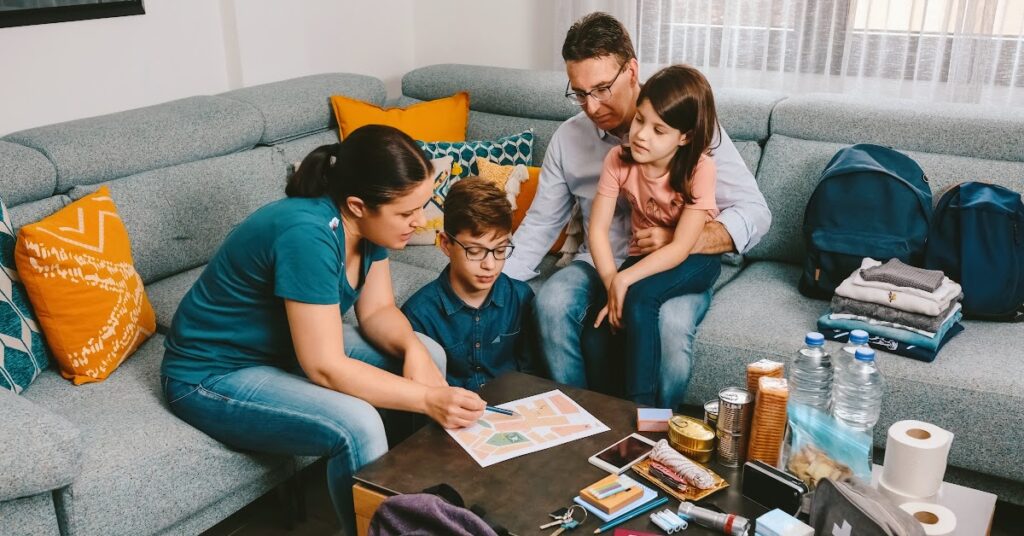 Preppers Guide - a family is preparing an emergency kit