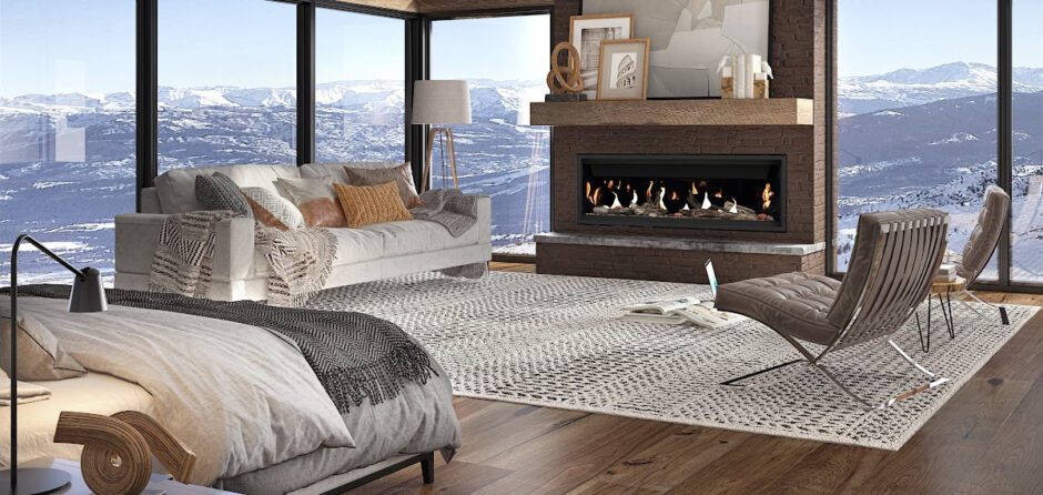 A beautiful bedroom with a view on the mountains and a gas fireplace