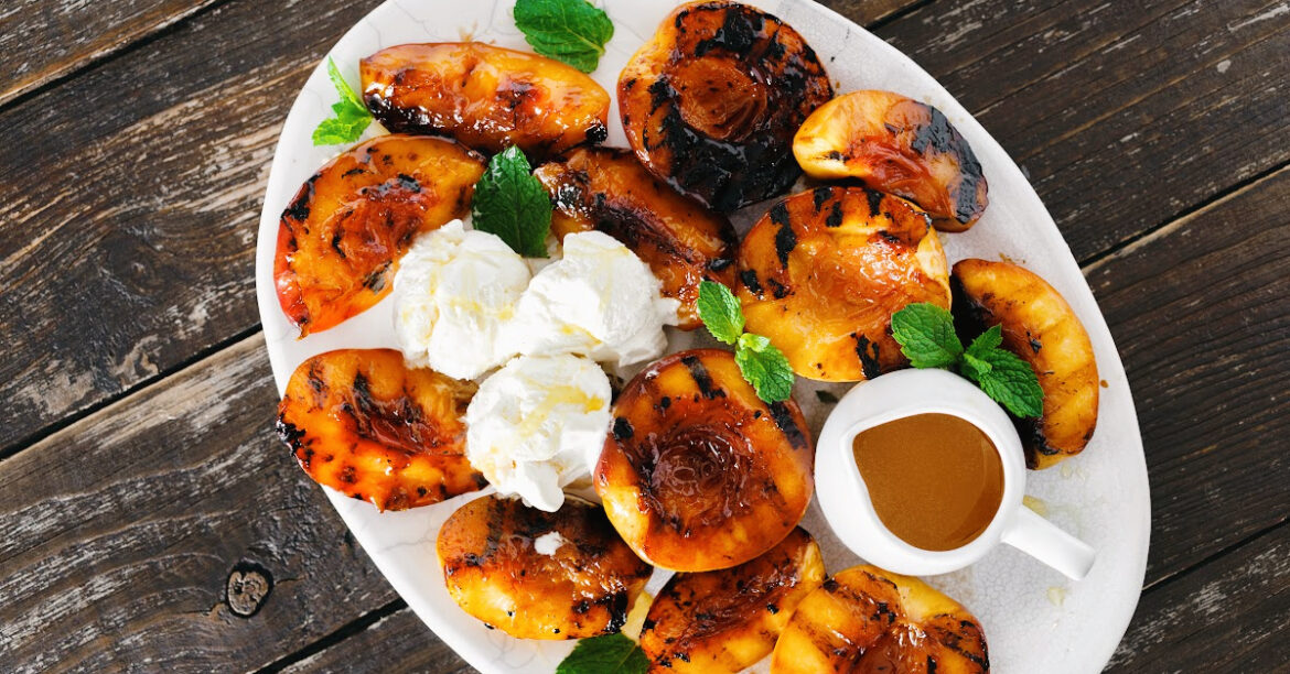 Succulent grilled peaches with ice cream and honey for a cozy alfreso dinner