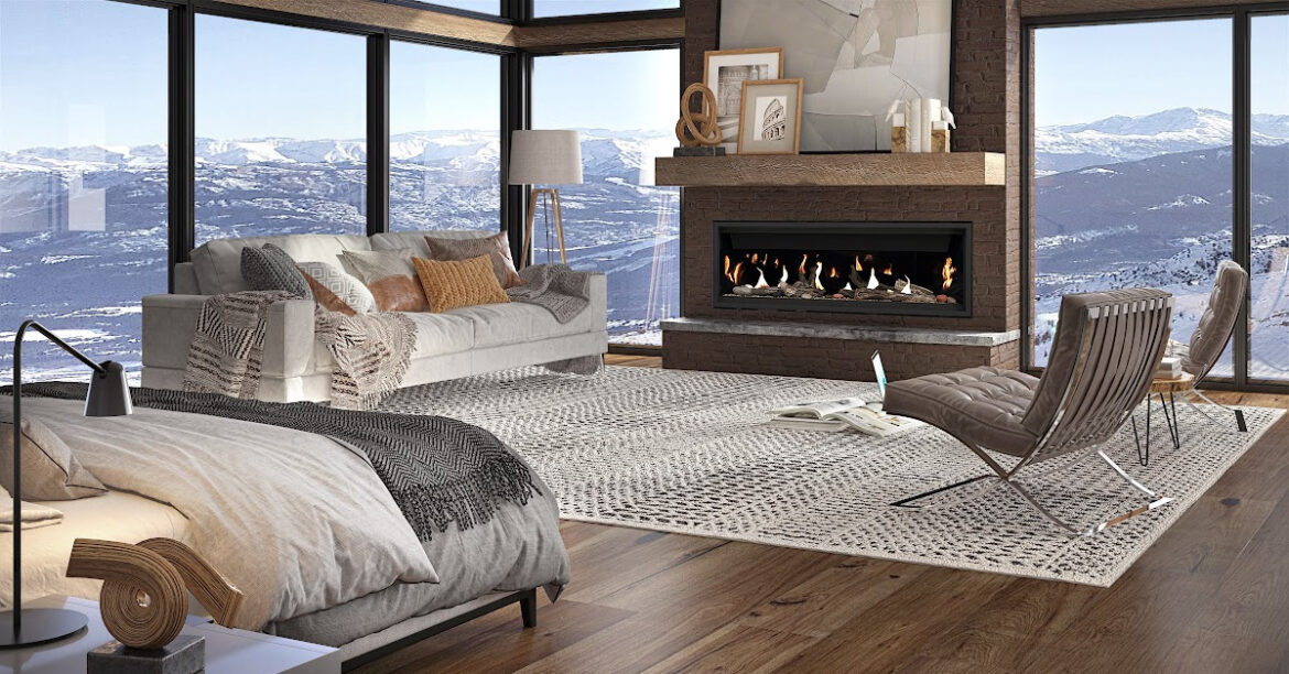 A gas fireplace in a beautiful bedroom with moutain views