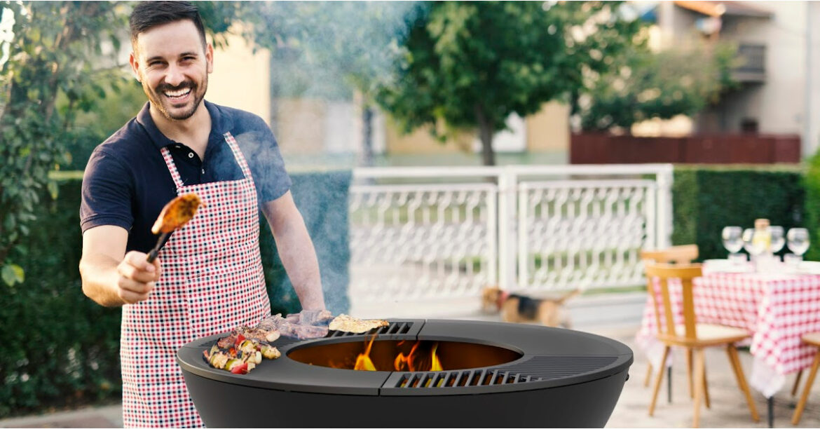 A man is grilling meat on a bbq